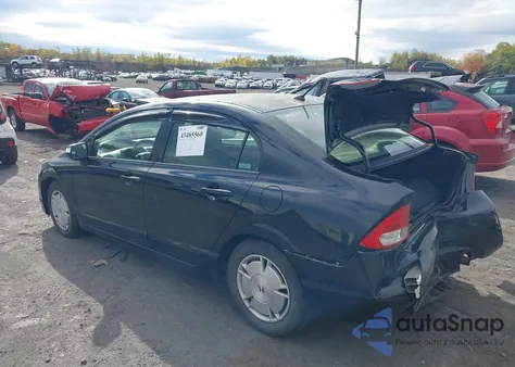 2009 Honda Civic Hybrid from USA, damaged, VIN JHMFA36279S013796